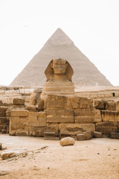 The Sphinx with pyramids in the background, Egypt